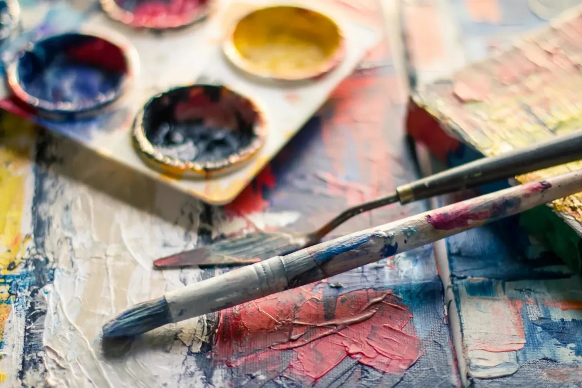 Paint brushes in a container